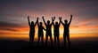 © Noor  - A triumphant team silhouetted against a fiery sunset, celebrating their victory with arms raised high, a powerful image of unity and achievement in warm golden hues.