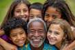 © Shahid Ashraf  - Grandfathers Joy Diverse Children Embrace Elderly Mans Happiness