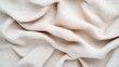 © PAPAHJAHATZ - Soft, draped cream-colored fabric texture
