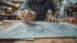 © Alpukat - Architect sketching interior design in workshop