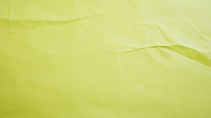 Wall Mural - lime green crumpled paper texture forming an abstract background