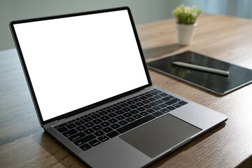 Wall Mural - laptop with blank screen on table. workspace background new project on laptop computer with blank co