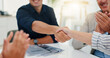 © WestLey/peopleimages.com - Success, handshake and deal with hands of business people in meeting for support, celebration and approval. Achievement, funding grant and applause with employees in office for news, b2b and results