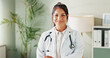 © peopleimages.com - Portrait, doctor or woman with confidence, healthcare or smile for wellness in clinic. Happy, professional help and person in hospital for career, pharmaceutical medicine or medical service in Mexico