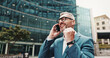 © peopleimages.com - Business man, phone call and celebrate in city for win with communication, approval or success. Mature corporate worker talking about career promotion, fist pump or excited for growth deal outdoor