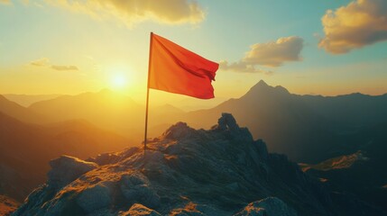 Fototapete - Bright red flag stands proudly at mountain peak during golden hour, showcasing adventure and natural beauty with dramatic shadows