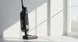 © Firman Dasmir - Sleek cordless vacuum cleaner in minimalist interior showcasing home appliance design