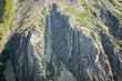 © Anna - Close up to mountain side cliffs with green grass and sharp shadows and bright highlights, High Tatra mountains, Slovakia