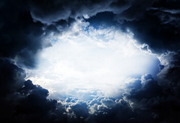 Wall Mural - hole in the storm clouds