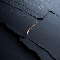 Leinwandbilder - Close up of dark gray layered stone with rough texture and golden vein against dark background