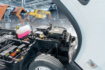 Fototapete - Electric truck in car service. Electric vehicles maintenance