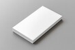© Shahida - Stack of White Rectangular Paper Sheets on a Gray Background, Office Supplies