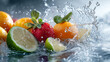 © Tahsin - Close up of fresh fruits including strawberry lime and oranges being splashed with water drops