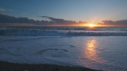 Wall Mural - sunset over sea with vibrant colors