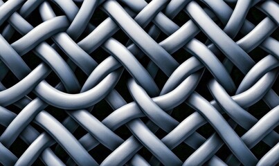 Intricate silver metal weave creating a robust and textured pattern, ideal for industrial backgrounds.
