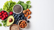 © Irina - neatly arranged flat lay of high-fiber foods for digestive health on clean, neutral background, including avocados, almonds, chia seeds, berries, whole grains, leafy greens, modern and minimalistic