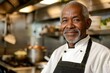 © NikoG - Senior male African American chef in a kitchen setting