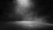 © Pixelzone - Empty space of Studio dark room concrete floor grunge texture background with spot lighting and fog or mist in black background.