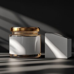 Poster - Elegant Glass Jar with Gold Lid and Box on Dark Surface - Product Mockup with Striking Light