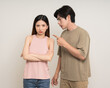 © Chanakon - Bad relationship unhappy asian couple quarreling in various action gesture standing on isolated white background. Shouting angry man and woman stressed has problem in Married life
