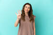 © luismolinero - Middle aged caucasian woman isolated on blue background happy and counting four with fingers