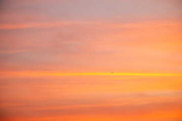 Wall Mural - beautiful , luxury soft gradient orange gold clouds and sunlight on the blue sky perfect for the bac