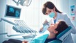 © Go - Woman dentist examines patient mouth in dental office with modern equipment detail