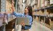 © Art_Photo - Female engineer is handling shipping and checking stock inventory in the warehouse with a laptop, industry, import-export, inventory management, logistics, global transportation at warehouse, business