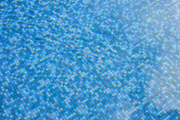 Wall Mural - swimming pool water surface and ripple wave with blue mosaic tiles