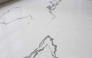 Aufkleber - Elegant white surface with flowing grey veins creates a sophisticated and natural stone texture. The abstract pattern offers a clean and modern aesthetic for design applications.