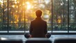 © EEKONG - Person Meditating in Serenity with Natural Light Through Windows