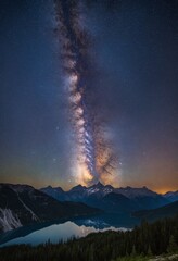 Wall Mural - celestial tapestry of the milky way illuminating the night sky over the towering wilderness of the n