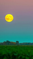Wall Mural - beautiful and massive red moon flowing in the sky, vertical time lapse view