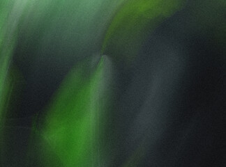 Wall Mural - a blurry abstract of green and black colors creating an indistinct and unfocused background image ef