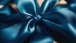 ©  zikakant - A beautiful turquoise satin ribbon elegantly tied in a decorative bow, showcasing the softness and sheen while adding elegance to any gift or decoration.