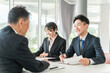 © buritora - 書類を確認する男女のビジネスマン（契約書・相談）