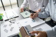© Charlie's - Solar panels green energy Business man working green eco friendly office business creative idea Planing Bio economy for business eco friendly professional Engineer sustainable electricity.
