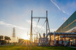 © agung - Sunset over a power substation and industrial coal powerplant facility in indonesia