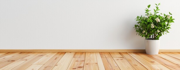 Poster - A minimalist room features light wood floo and a white wall with a potted plant adding a touch of nature.