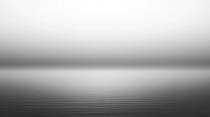 Poster - Serene grayscale seascape; calm water, misty horizon, tranquil atmosphere.