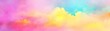 © guo - Colorful watercolor background of abstract sunset sky with puffy clouds in bright rainbow colors of pink blue yellow orange and purple