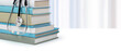 © TSViPhoto - Medical literature concept. Books and stethoscope. Medical students studying.