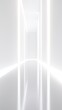 © Aris Suwanmalee - A futuristic corridor illuminated by bright white light reflecting off glossy surfaces.