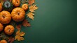 © Nathan - A vibrant display of orange pumpkins and autumn leaves on a green background, perfect for fall-themed decorations.