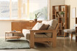 © Pixel-Shot - Interior of stylish living room with beige couch, wooden table and commode