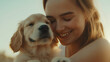 © MACKY - A young woman lovingly embraces a golden retriever puppy, sharing a moment of pure joy and companionship. The warm, soft light of the scene enhances the feeling of peace and affection