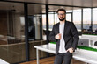 © F8  \ Suport Ukraine - Businessman posing confident and positive at workplace office with space