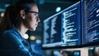 © Denis Yevtekhov - Female Engineer Coding Under Cool Tech Office Lighting