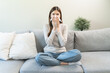 © Pormezz - Female unhealthy Sickness, asian young woman, girl unwell and coughing, have cold, sore throat isolated white background suffering with symptom cough feeling bad. Healthcare of Coronavirus, covid-19.