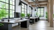 © A4719 - Modern industrial style office interior with wooden beams, large windows, and potted plants. Dark wood desks and black office chairs. Bright natural light.